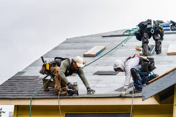 Professional Gutter Installation technician working in Bozeman, MT
